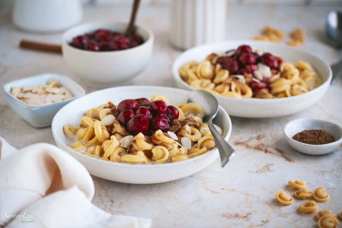 pasta cooked in sweetened milk served with preserved cherries